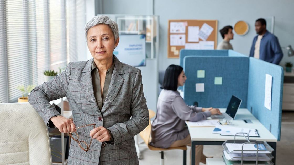 A business owner who mentors others, in her own office