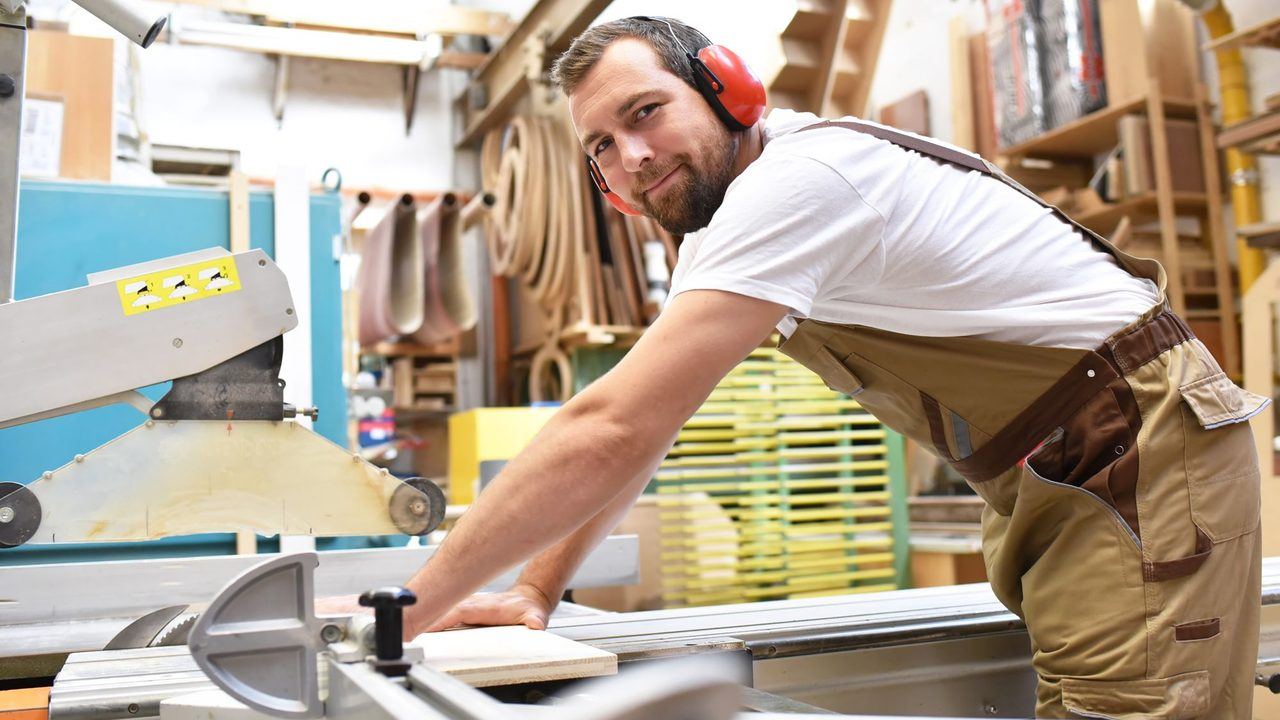 A tradesperson at work in their own workshop